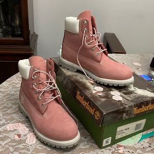 Size 7 Timberland boots in pink, grey, and white